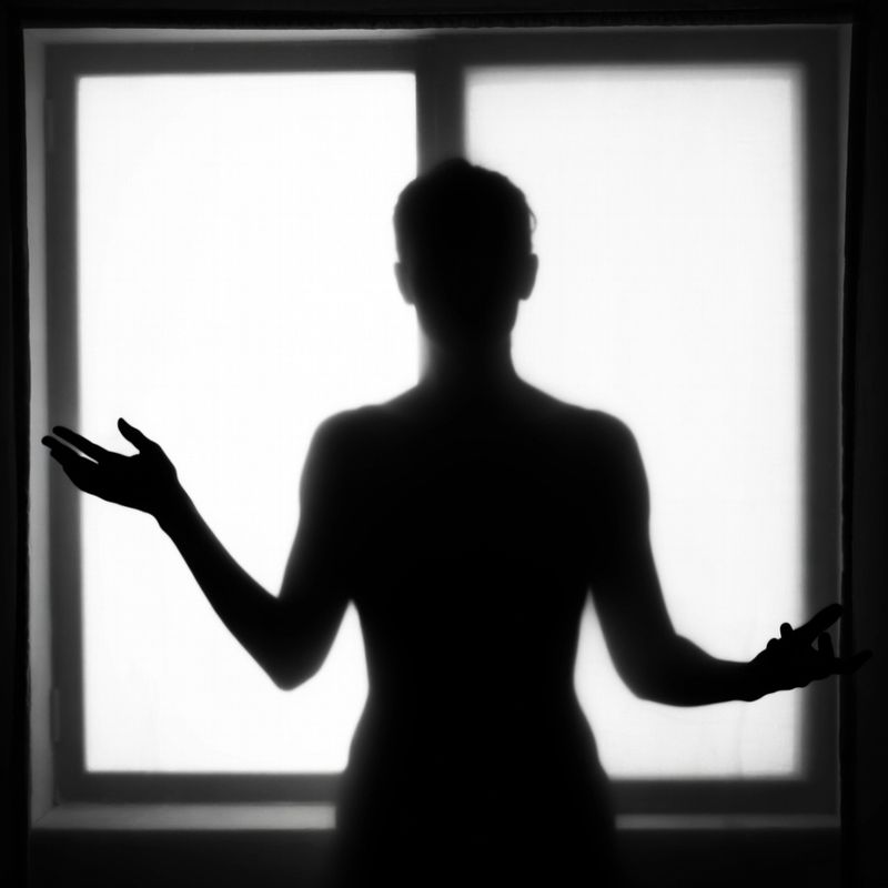 photos-people-editorial-portraits · Silhouette Against Bright Window