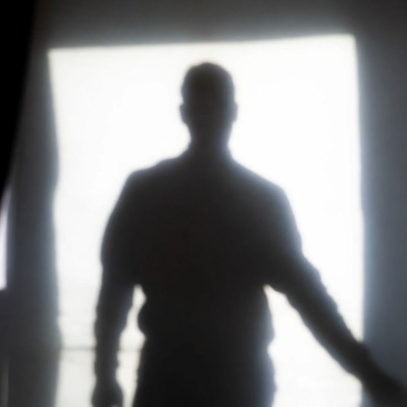 photos-people-editorial-portraits · Silhouette Against Bright Window